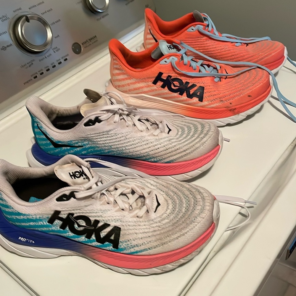 Two pair of Hoka women’s shoes